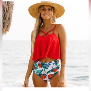 New with tags tankini swimsuit. Hish waist bottoms. Size XL.  Smoke free home.